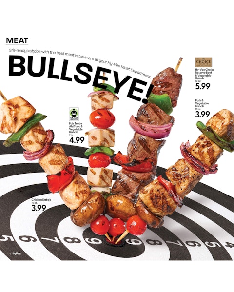 A spread of a grilling kabobs story from Hy-Vee Mega Ad magazine, featuring a few kabobs stuck into the center of a target.